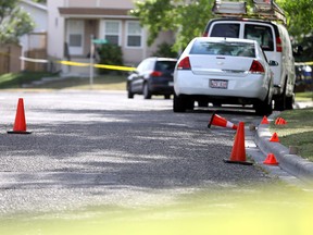 The scene of a shooting which left two men dead on Sandarac Road N.W. on Aug. 28, 2020.