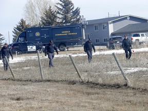 Calgary police were still on scene, expanding their search and collecting evidence at a property on Vale View Road in Rocky View County on Sunday, April 9, 2023.