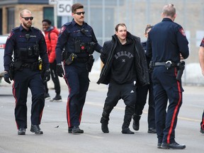 Police arrest a suspect in several stabbings and assaults in downtown Calgary on Monday, April 3, 2023. None of the victims' injuries were considered life-threatening.