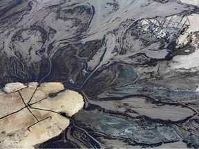Oil goes into a tailings pond at an oilsands operation near Fort McMurray.