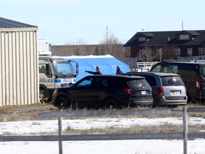 Calgary police search a property on Vale View Road in Rocky View county on Saturday, April 8, 2023.
