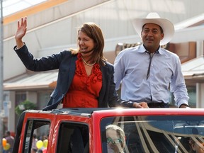 Danielle Smith, then-Wildrose Party leader and then-Alberta Liberal Party leader Raj Sherman, seen during the K-Days Parade in downtown Edmonton on July 18, 2014.