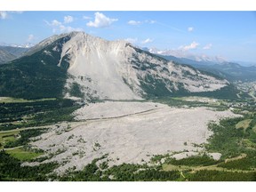 Hwy 3 passes right through the Frank Slide area in the Crowsnest Pass. On April 29, 1903, 110 million tonnes of limestone crashed from the summit of Turtle Mountain and buried part of the sleeping town of Frank. [PNG Merlin Archive]