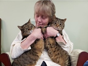 Helen Naslund, seen with her cats Star and Jewel, was released from prison on day parole March 20, 2023. Naslund was sentenced to 18 years for killing her abusive husband and hiding his body — a sentence that was later reduced to nine years after a public outcry.