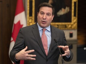 Public Safety Minister Marco Mendicino speaks about the government's firearms buyback program in the foyer of the House of Commons, Wednesday, April 26, 2023 in Ottawa.
