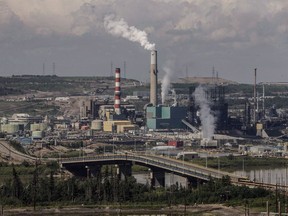 Suncor's base plant with upgraders in the oilsands in Fort McMurray Alta, on Monday June 13, 2017. New federal research suggests greenhouse gas emissions from the oilsands may be significantly underestimated, adding to a growing pile of studies that say our understanding of what is going into the atmosphere is incomplete.