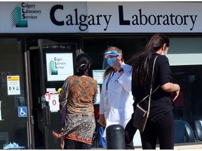 Calgarians wait to enter the Sunridge lab services location in September 2020. A change in provider has led to declining service, reader says.