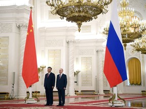 Russian President Vladimir Putin and Chinese President Xi Jinping at the Kremlin in Moscow.