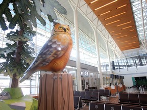 An animatronic owl, part of Jeff de Boer's Nature's Playground, in the International departure area.