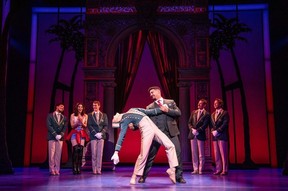 Trent Soyster, left, and Travis Ward-Osborne with the company of Pretty Woman: The Musical. Courtesy, Matthew Murphy for MurphyMade