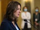 Danielle Smith, leader of the United Conservative Party of Alberta, announces the party's public health guarantee during a press conference on Tuesday, April 11.