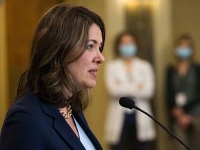 Danielle Smith, Leader of the United Conservative Party of Alberta, announces the party's public health guarantee, during a press conference on Tuesday April 11.