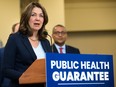 Premier Danielle Smith announces the UCP's public health guarantee on April 11.