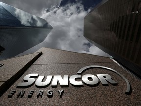FILE PHOTO: The Suncor Energy logo is seen at their head office in Calgary, Alberta, Canada, April 17, 2019.