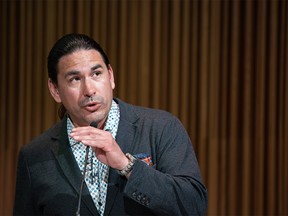 Harold Horsefall, issues strategist at the City of Calgary Indigenous Relations Office, Indian Residential School memorial report to the community and endorsement ceremony at Calgary Central Library on Wednesday, May 31, 2023.