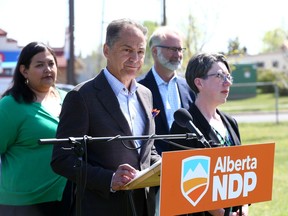 NDP MLA Joe Ceci speaks at the podium during an event at Bergen Park in northwest Calgary on Friday, May 12, 2023. A group of candidates spoke about the Alberta NDP's $1.2 billion plan to build a better future in Calgary.