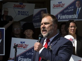 Artur Pawlowski on the steps of the Alberta legislature during the May 2023 provincial election