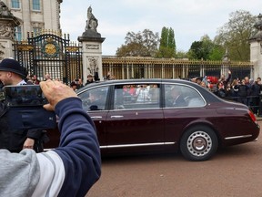 Britain's King Charles arrives at Buckingham Palace in London, Tuesday, May 2, 2023.