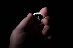 Apple and Google have proposed a tech standard to make sure people get tipped off when their movements are being tracked with Bluetooth devices like AirTags or Tile. Brendan Smialowski / AFP