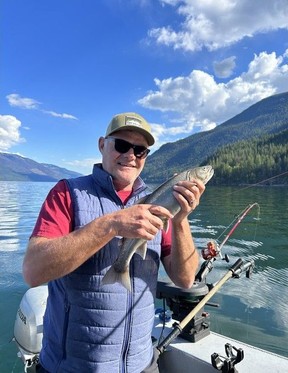 Andrew Penner with his bull trout. Courtesy, Andrew Penner