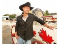 Calgary born country music star Paul Brandt poses for a photo on the Stampede Grounds. Brandt is using his voice to raise awareness for his #NotInMyCity campaign focused on eliminating human trafficking and acts of children being exploited for sex in Canada. Monday, July 8, 2019. Brendan Miller/Postmedia