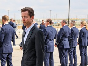 WestJet CEO Alexis von Hoensbroech watches as WestJet pilots hold an informational picket at the Calgary International Airport on May 8.
