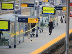 Calgary police investigate the scene of an early morning stabbing at the Marlborough CTrain station on May 10.