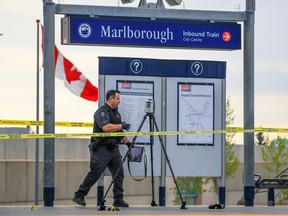 Calgary police investigate the scene of an early morning life-threatening stabbing at the Marlborough CTrain station on Wednesday, May 10.
