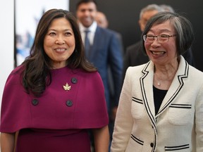 Federal International Trade and Economic Development Minister Mary Ng, left, and Grace Wong, board chair of the Chinese Canadian Museum arrive for an announcement at the museum, in Vancouver, on Tuesday, May 23, 2023. The museum, which is scheduled to open to the public on July 1, has received more than $5 million from the federal government for its building and space renewal at their new permanent location in Vancouver's Chinatown.