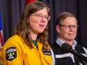 Christie Tucker, Information Unit Manager, Alberta Wildfire speaks as Colin Blair, Executive Director, Alberta Emergency Management Agency listens during an update on the Alberta wildfire situation.  Taken on Sunday, May 7, 2023 in Edmonton.  Greg Southam-Postmedia