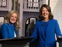 Alberta NDP leader Rachel Notley and UCP leader Danielle Smith shake hands as they pose for a photo prior to their debate at CTV Edmonton, Thursday May 18, 2023. 