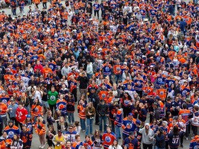 People take part in the Edmonton Oilers watch party in the Ice District on Saturday, May 6, 2023 in Edmonton.