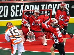 Calgary Roughnecks Christian Del Bianco makes save on Shawn Evans of the Buffalo Bandits during the 2019 National Lacrosse League final at the Scotiabank Saddledome in Calgary on Saturday, May 25, 2019. Al Charest/Postmedia