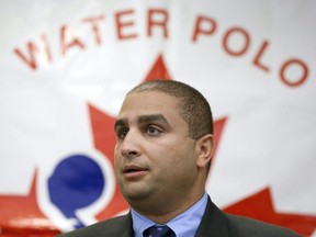 Swimming Canada says chief executive officer Ahmed El-Awadi will be taking a personal leave of absence starting Monday. El-Awadi holds a news conference in Ottawa on September 27, 2011.