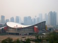 Smoke from wildfires shrouds Calgary's downtown skyline on May 17.