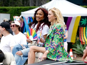 From left, Garcelle Beauvais and Sutton Stracke attend the 2023 WeHo Pride Parade on June 4 in Hollwyood. Beauvais will be given the Inclusion Award at the Banff World Media Festival.