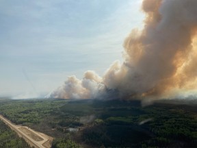 FILE PHOTO: The Red Creek fire (G80223) burns in the Peace River Regional District of British Columbia in a May 5, 2023, handout photo.