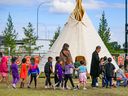Students take part in National Indigenous Peoples Day activities at Piitoayis Family School on Wednesday, June 21, 2023.