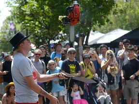 Colin the Amazing Juggler performs as thousands came out for the annual Lilac Festival in Calgary on Sunday, June 4, 2023.
