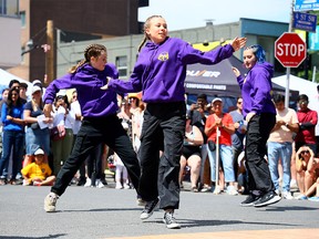 Dancers perform as thousands came out for the annual Lilac Festival in Calgary on Sunday, June 4, 2023.