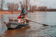 An image of Paul Grindlay on a guided fly fishing tour with a client on the Bow River.