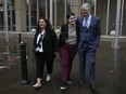 Steve Johnson, right, the brother of Scott Johnson, walks with his wife Rosemarie, left, and daughter Tessa outside the New South Wales Supreme Court in Sydney, Thursday, June 8, 2023.
