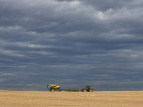 Farmer preparing crops in Alberta