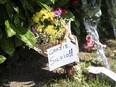 Flowers and a note reading Thank you Silvio are laid in front of Silvio Berlusconi's Villa San Martino residence in Arcore, near Milan, Italy, Monday, June 12, 2023. Italian media are reporting that Silvio Berlusconi, the boastful billionaire media mogul who was Italy's longest-serving premier despite scandals over his sex-fueled parties and allegations of corruption and bribery, has died at age 86.