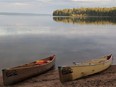 Canoes are seen along Kingsmere Lake as paddlers make their way to Grey Owl's cabin in Prince Albert National Park in northern Saskatchewan.