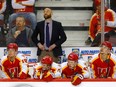Head coach Mitch Love is pictured behind the bench of the Calgary Wranglers, who have been eliminated from the playoffs by the Coachella Valley Firebirds in a deciding Game 5 of the Pacific Division final.