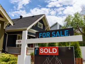 A real estate for sale sign in Calgary was photographed on Wednesday, June 1, 2022.
