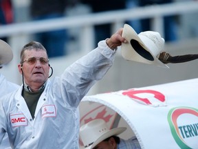 Chuckwagon legend Kelly Sutherland salutes the crowd after racing in his last GMC Rangeland Derby at the Calgary Stampede on Sunday July 16, 2017.