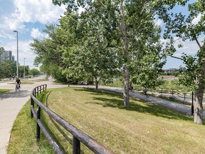 The RiverWalk promenade just west of the 10 Street bridge was photographed on Tuesday, July 25, 2023.