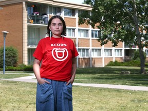 Krislyn Jagt poses in the courtyard at her southeast Calgary apartment complex on Friday, July 21, 2023.